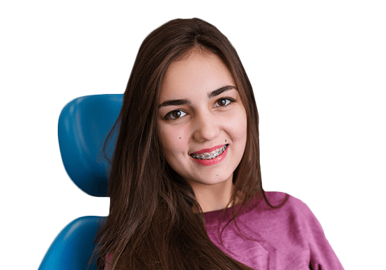 Young woman in exam chair with braces